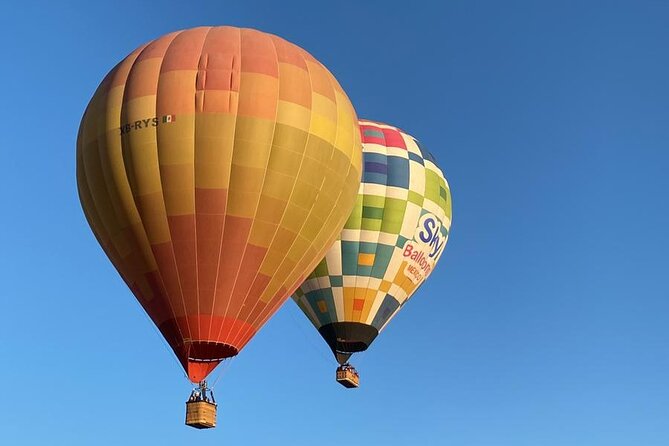 Balloon flight + Transportation + Breakfast in Cave or buffet + Pyramids - Who will get the most from this day