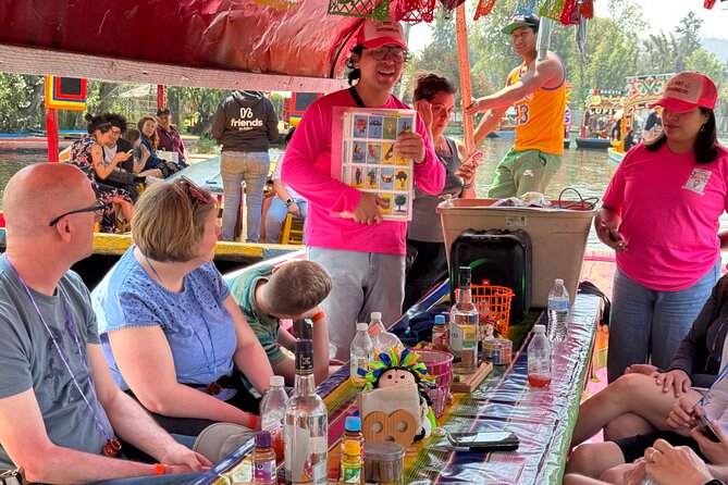 Boat Tour in Mexico City and Mezcal Fiesta with Food and ∞Drinks - Guides who keep the boat moving