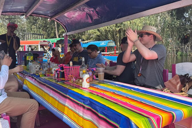 Boat tour in Mexico City with Live Guide with Food and Drinks - Food, tequila, pulque, and the return ride