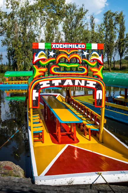 CDMX: Coyoacán, UNAM, Xochimilco, and optional Frida Kahlo Museum - Morning pickup and the cooperative shop
