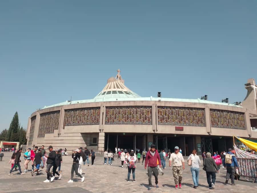 Discover the iconic Basilica of Guadalupe in Mexico City. - A traditional market adds local texture