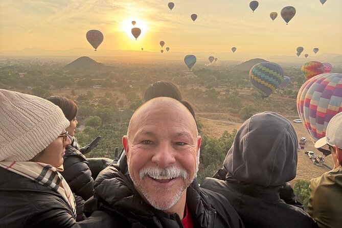 Hot Air Balloon Flight with Breakfast Cave and Pyramids Tour - Walking the Teotihuacan pyramids