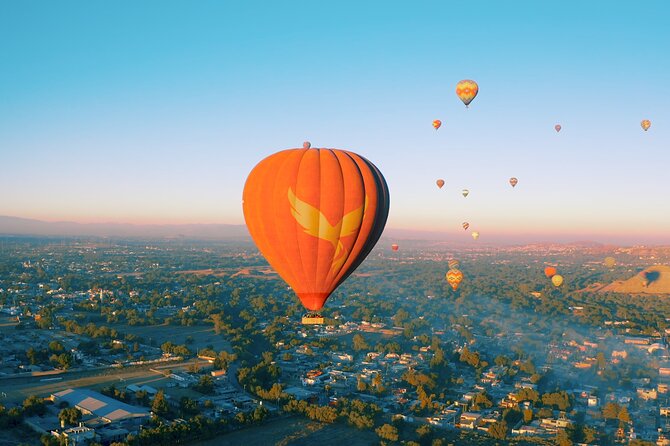 Hot Air Balloon Ride Over Teotihuacán Pyramids from Mexico City - Champagne, juice, and the flight certificate