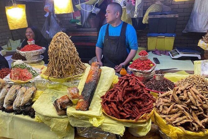 Mexico City : Exploring Mystic Markets La Merced & Sonora Food Tour - Narrow aisles, moving carts, and a working market