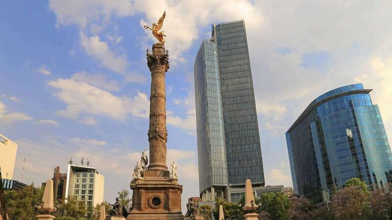 Mexico City: Hop-on Hop-off City Tour with Attractions - How the audio guide changes the ride