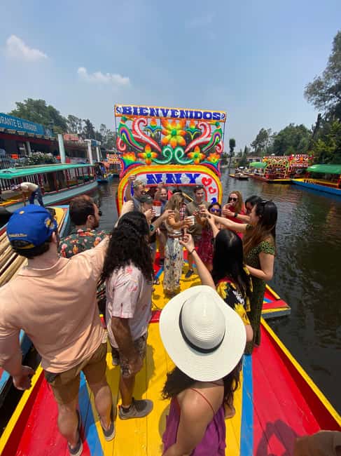 Mexico City: Xochimilco Boat with Guacamole & Premium Drinks - Making guacamole instead of just eating it