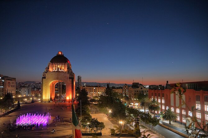 Night Tour of Mexico City Panoramic Ride on a Double-Decker Bus - The three-tower modern complex