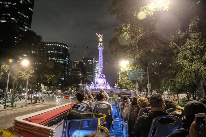 Night Tour of Mexico City Panoramic Ride on a Double-Decker Bus - Choosing the upper deck, and preparing for the weather