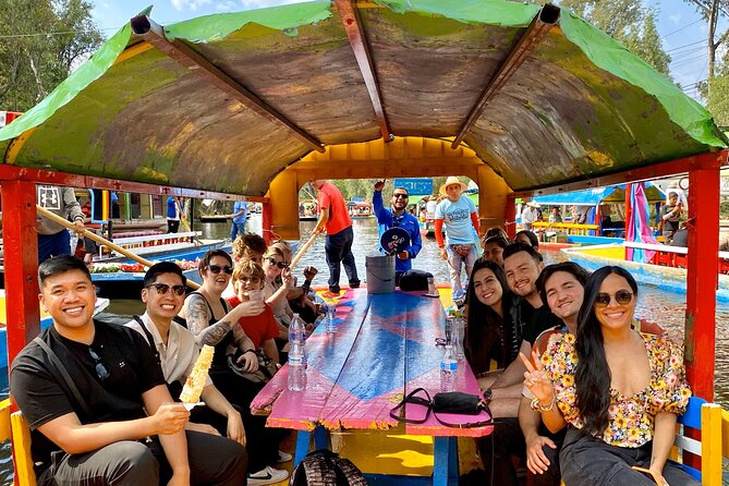 Trajinera Party at Xochimilco with Drinks, Mariachi & Snacks - Two hours of drinks, dancing, and music