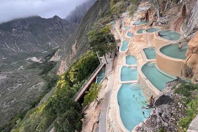 Visit Tolantongo hotsprings with 2025 Car Private Tour from CDMX - The suspension bridge, tunnel, and small waterfalls