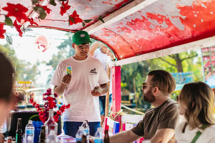 Xochimilco: traditional boat tour, culture, and fun. - Meeting beneath the purple arch at Las Flores Nativitas